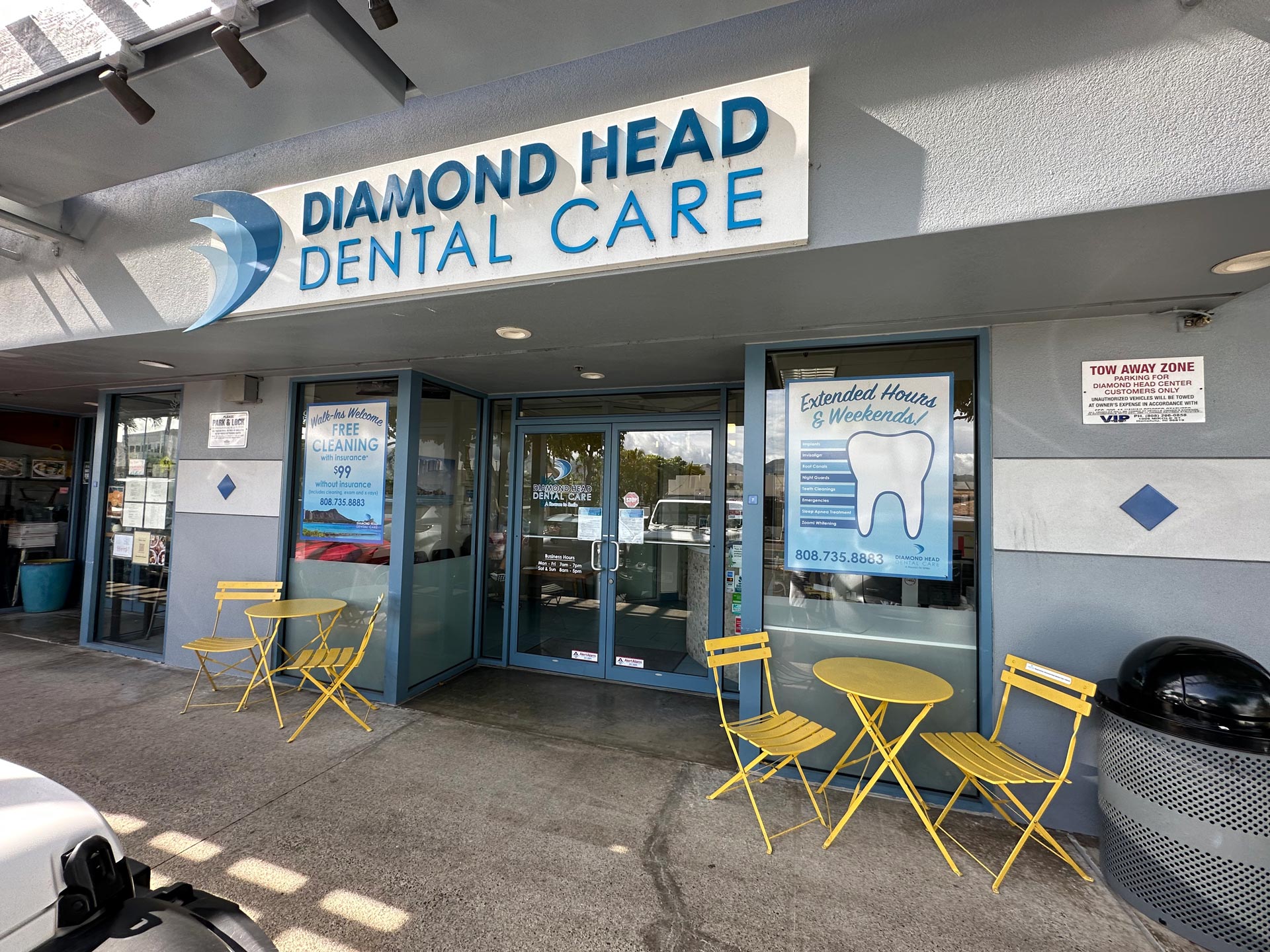The image shows a storefront with a sign that reads  Diamond Head Dental Care  above a door, indicating that this is a dental care facility.